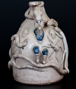 Temperance Jug with Elaborate Applied Figural Decoration