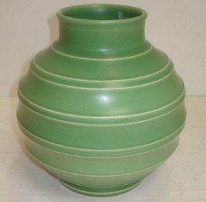 Keith Murray for Wedgwood: a green glazed bomb shape vase