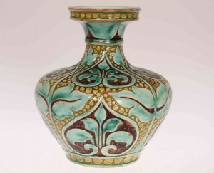 A Della Robbia Pottery Vase by Lizzie Wilkins incised and painted with foliage no 3388