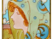 Charlotte Rhead a tube-lined tile decorated with the head of a girl wearing elaborate headdress
