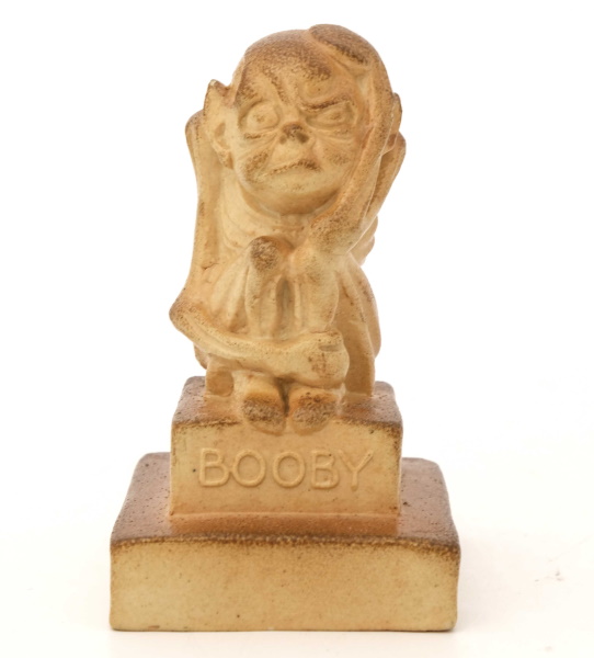 Leslie Harradine for Royal Doulton a stoneware Whist Booby figure circa 1910