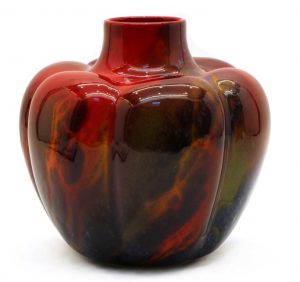 A Royal Doulton Flambe Sung vase of pumpkin form designed by Charles Noke signed Sung and Noke to base