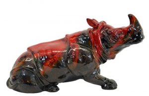 Leslie Harradine for Royal Doulton a large Sung veined Flambe figure of a rhino