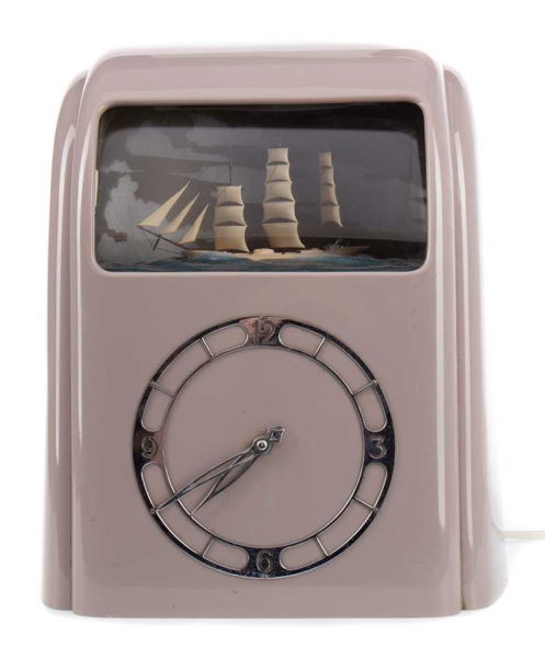 grey case Vitascope clock with gold dial