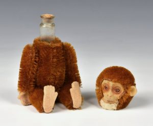 A Schuco perfume bottle monkey