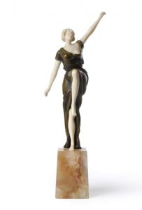 Georges Omerth A Patinated Bronze and Ivory Dancer