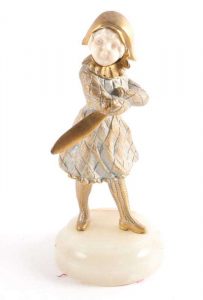 Georges Omerth a patinated bronze and ivory figure of a young boy numbered 7610