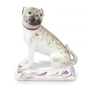 A Lowestoft model of a pug dog circa 1775