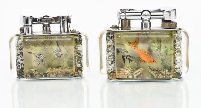 A Dunhill Aquarium table lighter by Ben Shillingford featuring angelfish and fantail fish