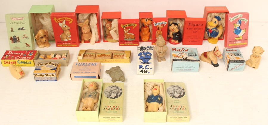 A collection of assorted boxed novelty soaps including Disney and Muffin the Mule