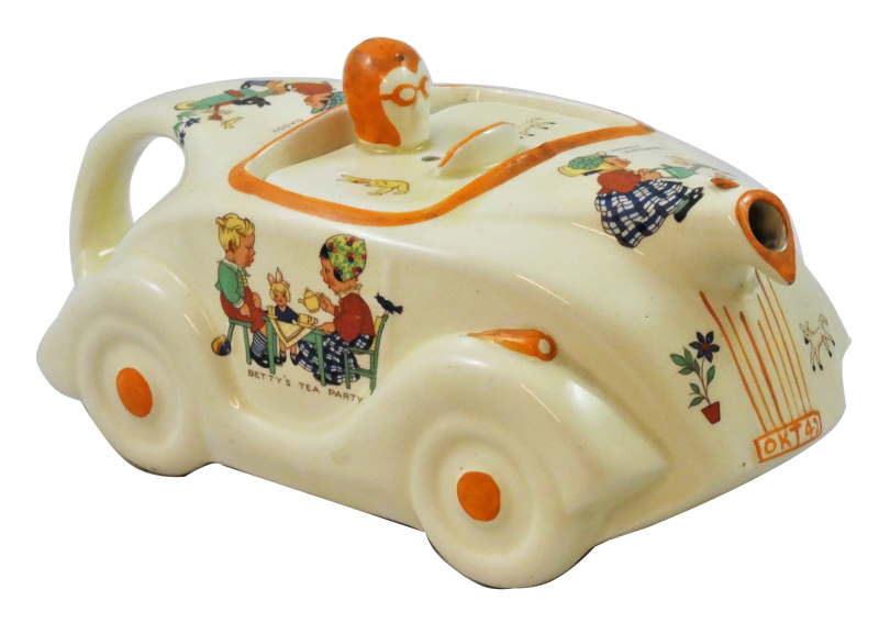 A racing car teapot by James Sadler with transfer printed nursery scenes designed by Mabel Lucie Attwell