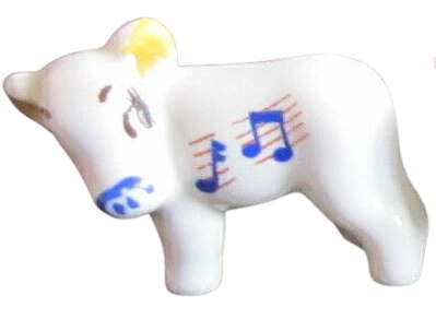 Wade Minikins Cow from Series B which was issued 1956-1958. The Minkin shows the Motif, colour of ears and eye design.