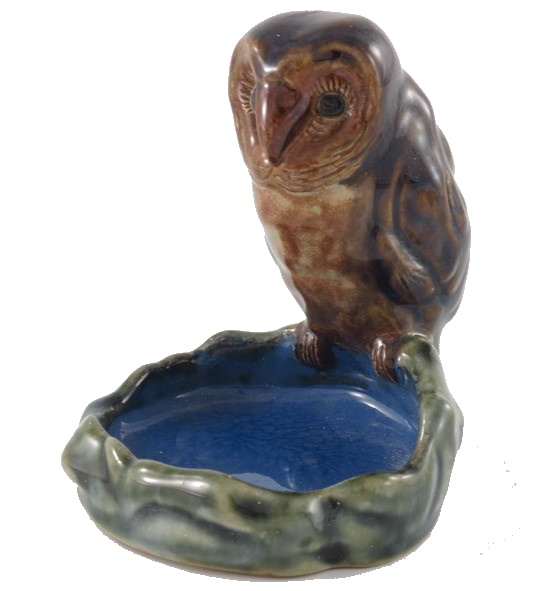 Harry Simeon for Doulton Lambeth a stoneware bibelot modelled as an owl on the edge of a pond