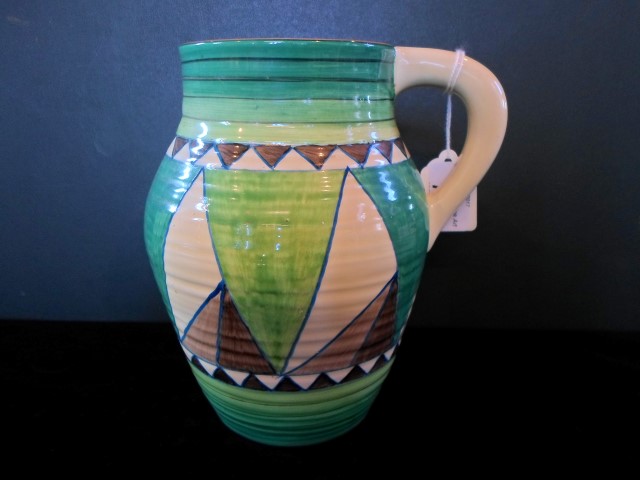 A Clarice Cliff single handled vase in the green Killarney pattern