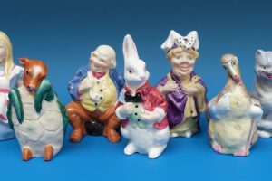 Freda Doughty Royal Worcester candle snuffers from The Alice in Wonderland Series