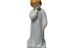 A DOULTON & Co DARLING FIGURINE HN1 designed by Charles Vyse circa 1913