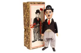 Schuco Charlie Chaplin tinplate clockwork figure with box