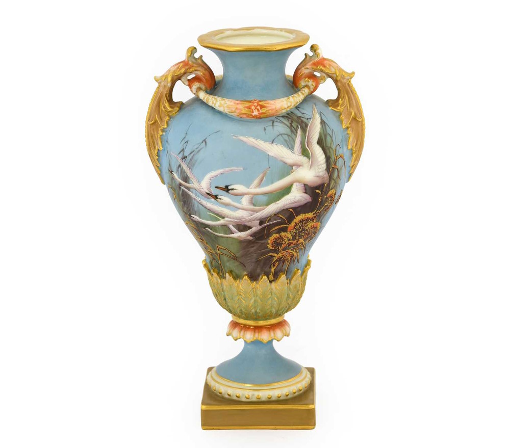 A Royal Worcester Porcelain Vase by Charles Baldwyn 1899 painted with flying swans