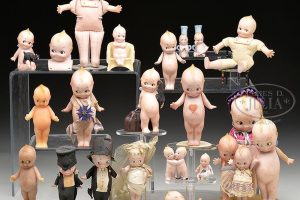 A collection of various Kewpie Dolls