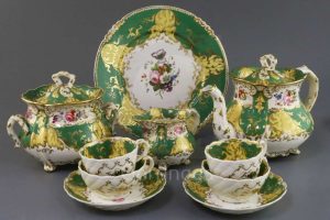 A Rockingham neo-rococo teaset c1830-5,each piece painted with a floral bouquet