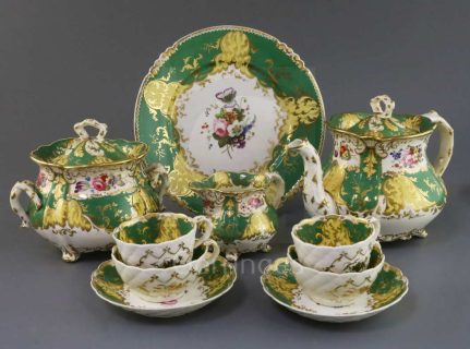 A Rockingham neo-rococo teaset c1830-5,each piece painted with a floral bouquet